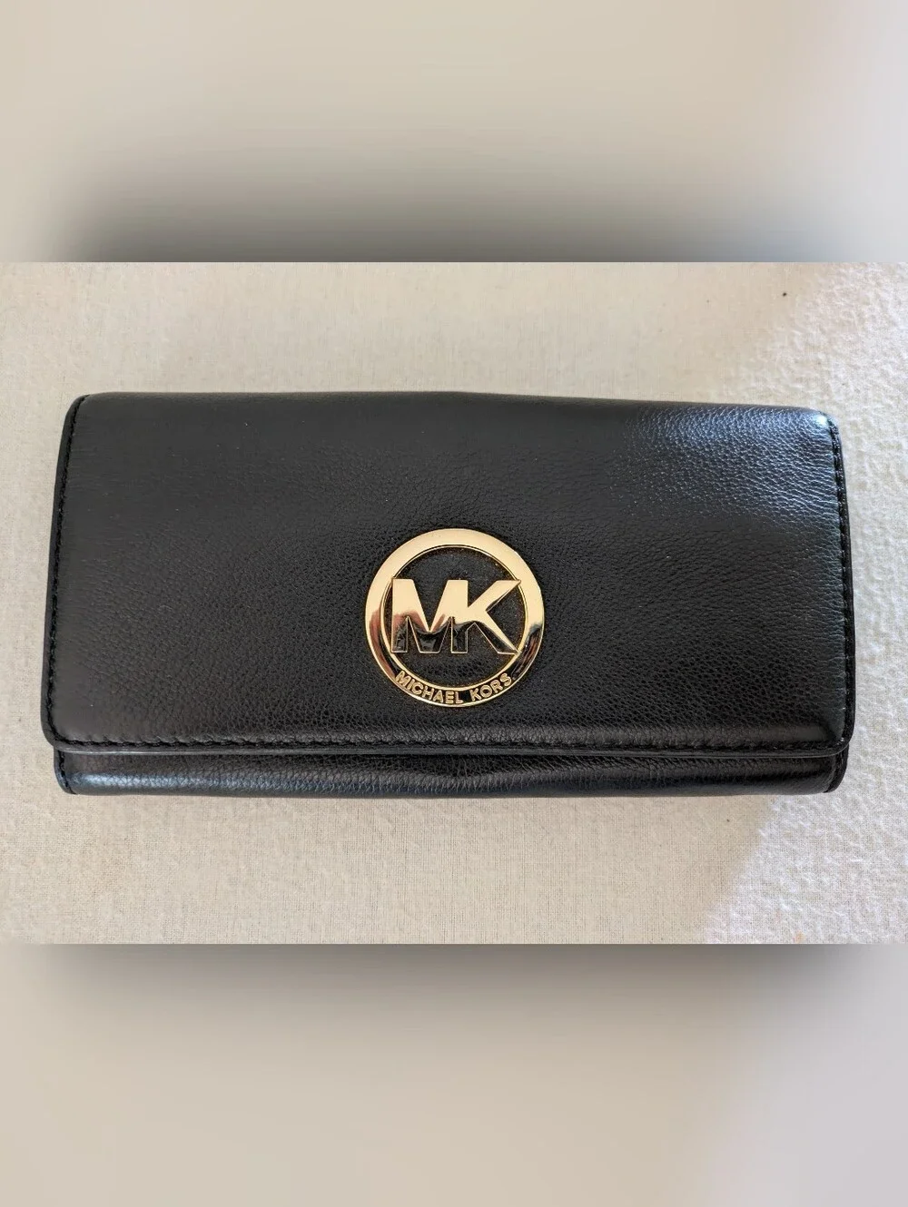 Michael Kors Black Leather Fulton Continental Wallet with Gold MK Emblem